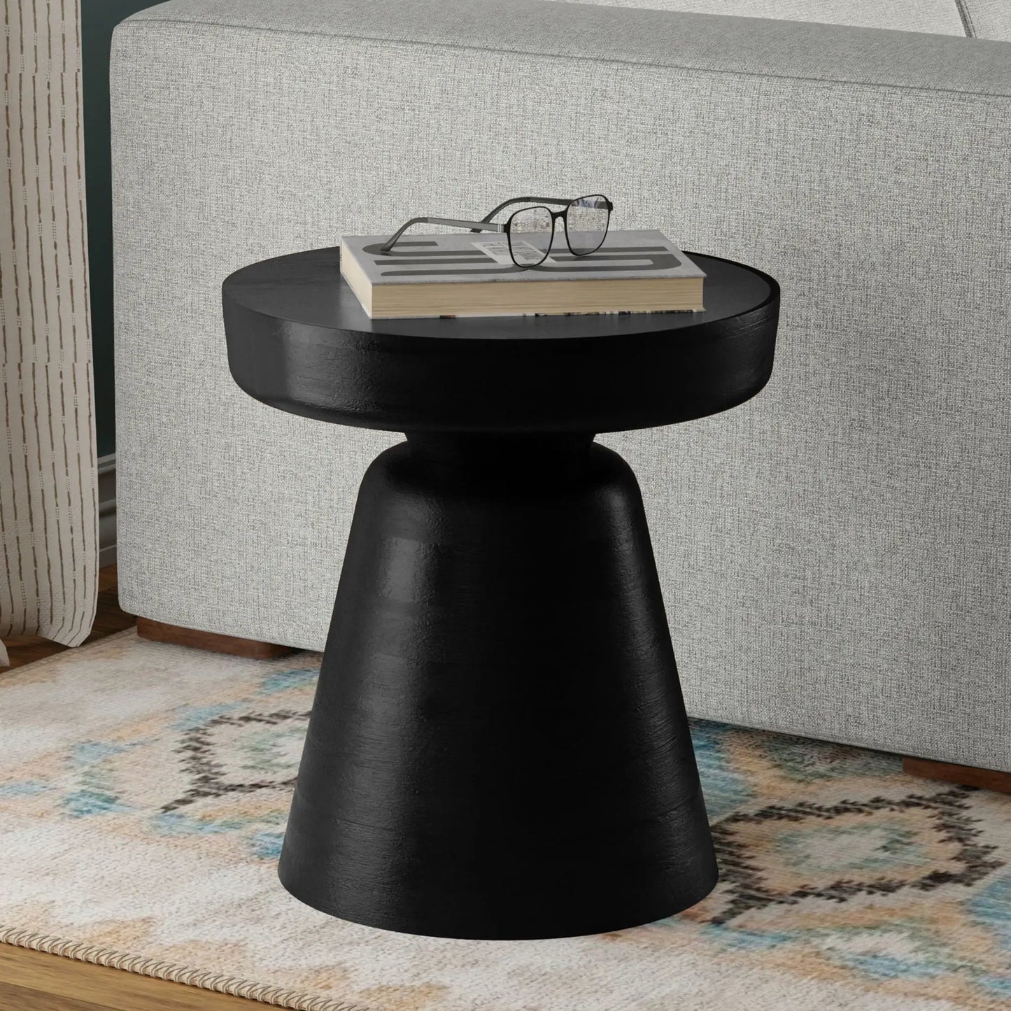 Robbie Handcrafted Accent Table with gray top and black pedestal base, book and glasses 2 items on Tampa Home & Garden Store