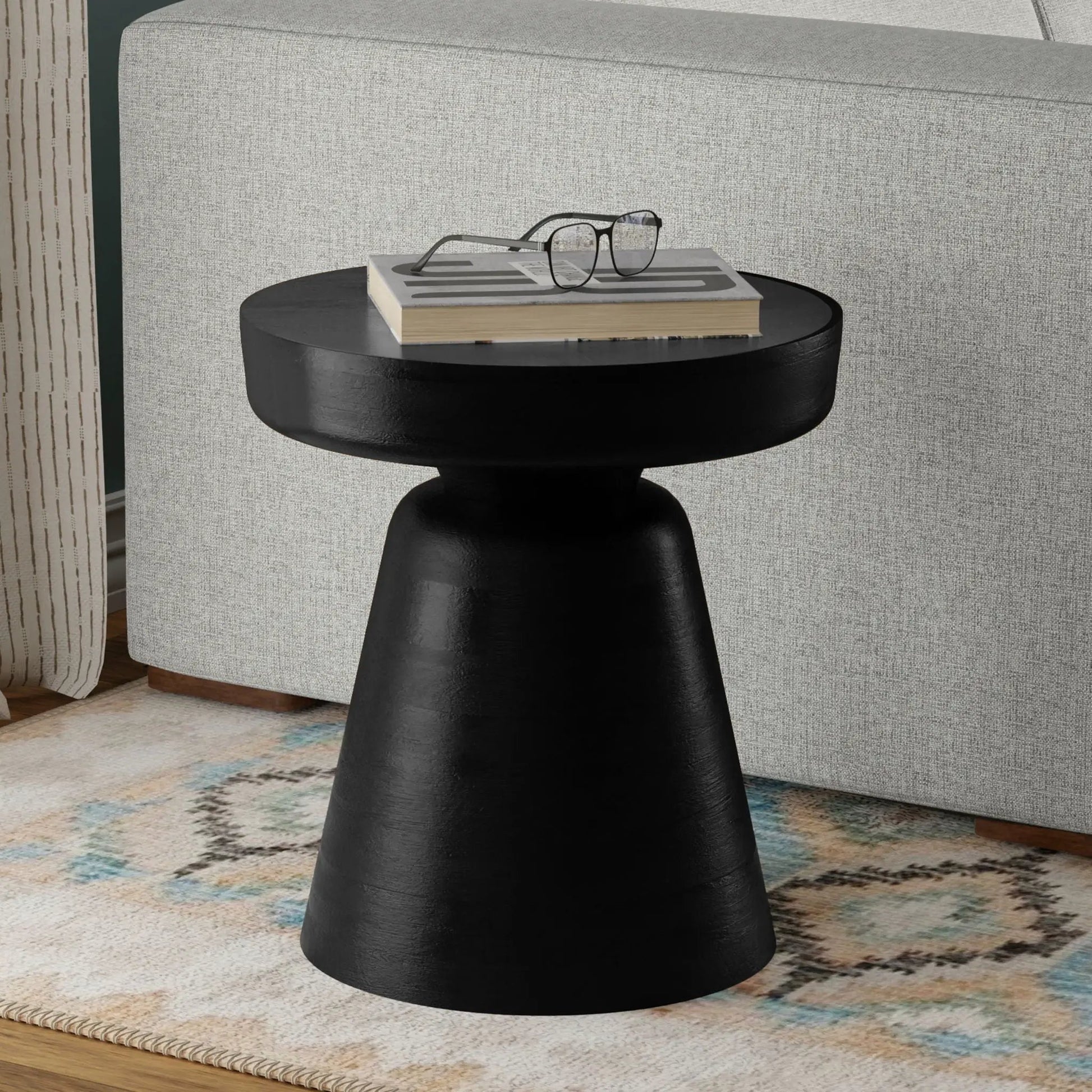 Robbie Handcrafted Accent Table with gray top and black pedestal base, book and glasses 2 items on Tampa Home & Garden Store