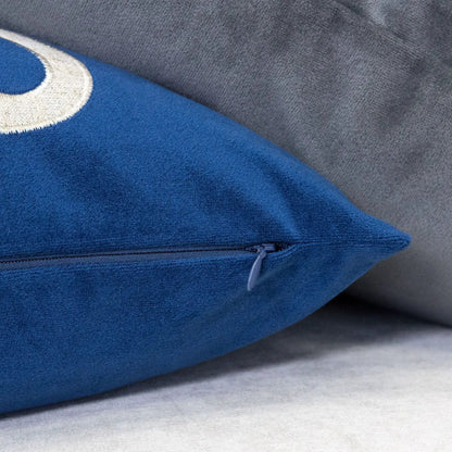 Dora pillow cover with matching back, blue velvet with beige circle motif and visible zipper on Tampa Home & Garden Store