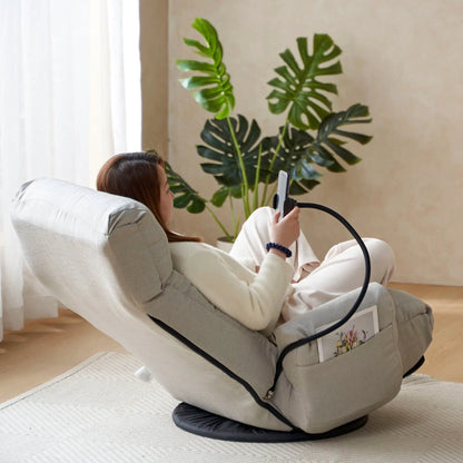 Adjustable swivel lounge chair in light gray fabric with headrest and 360° rotation on Tampa Home & Garden Store