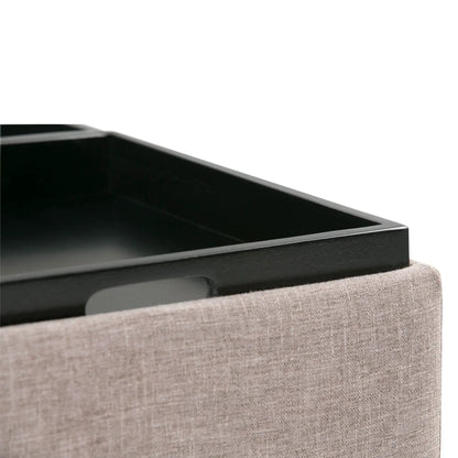 Avalon square coffee table storage ottoman with black glossy top and beige fabric base on Tampa Home & Garden Store