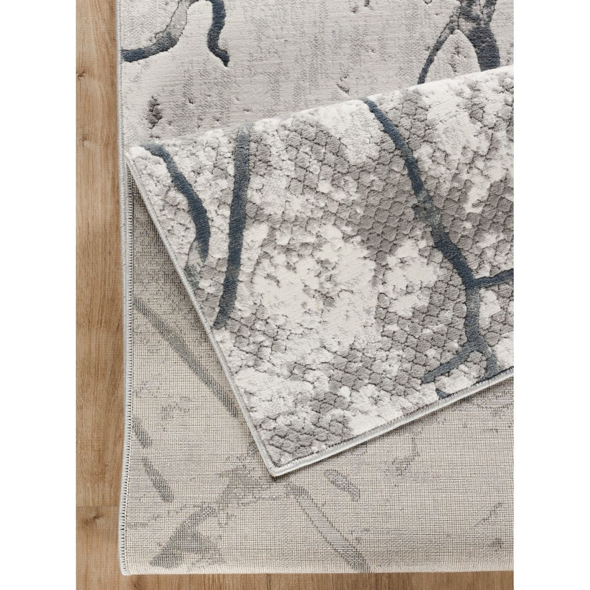 Geometric 3D Area Rug by HouseOfZazla in ivory and gray on Tampa Home & Garden Store
