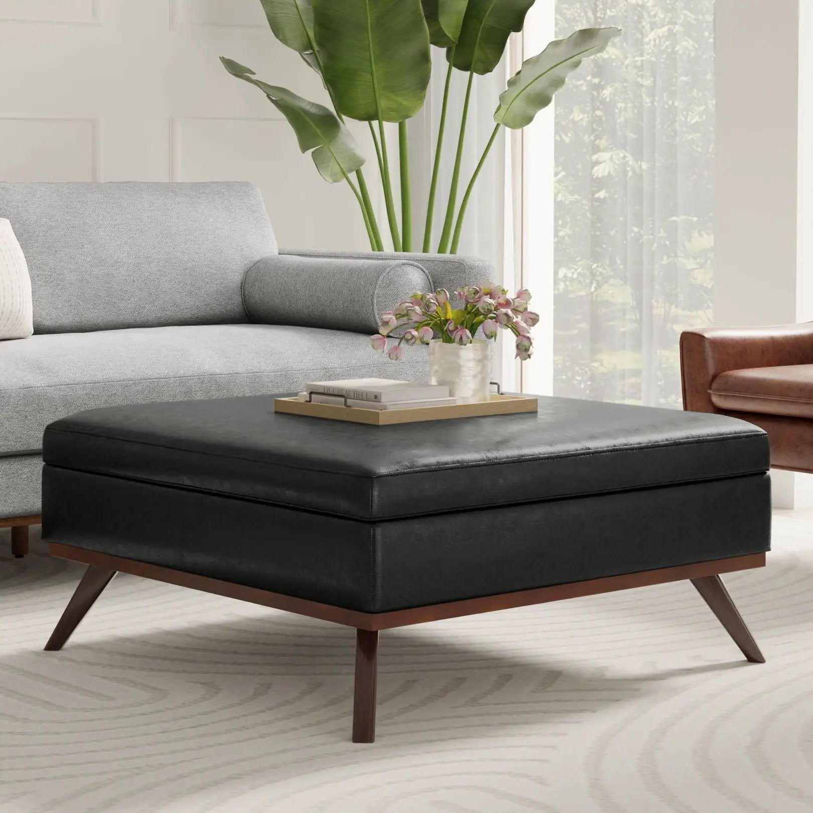 Owen multifunctional square coffee table storage ottoman, black faux-leather top with wooden legs on Tampa Home & Garden Store
