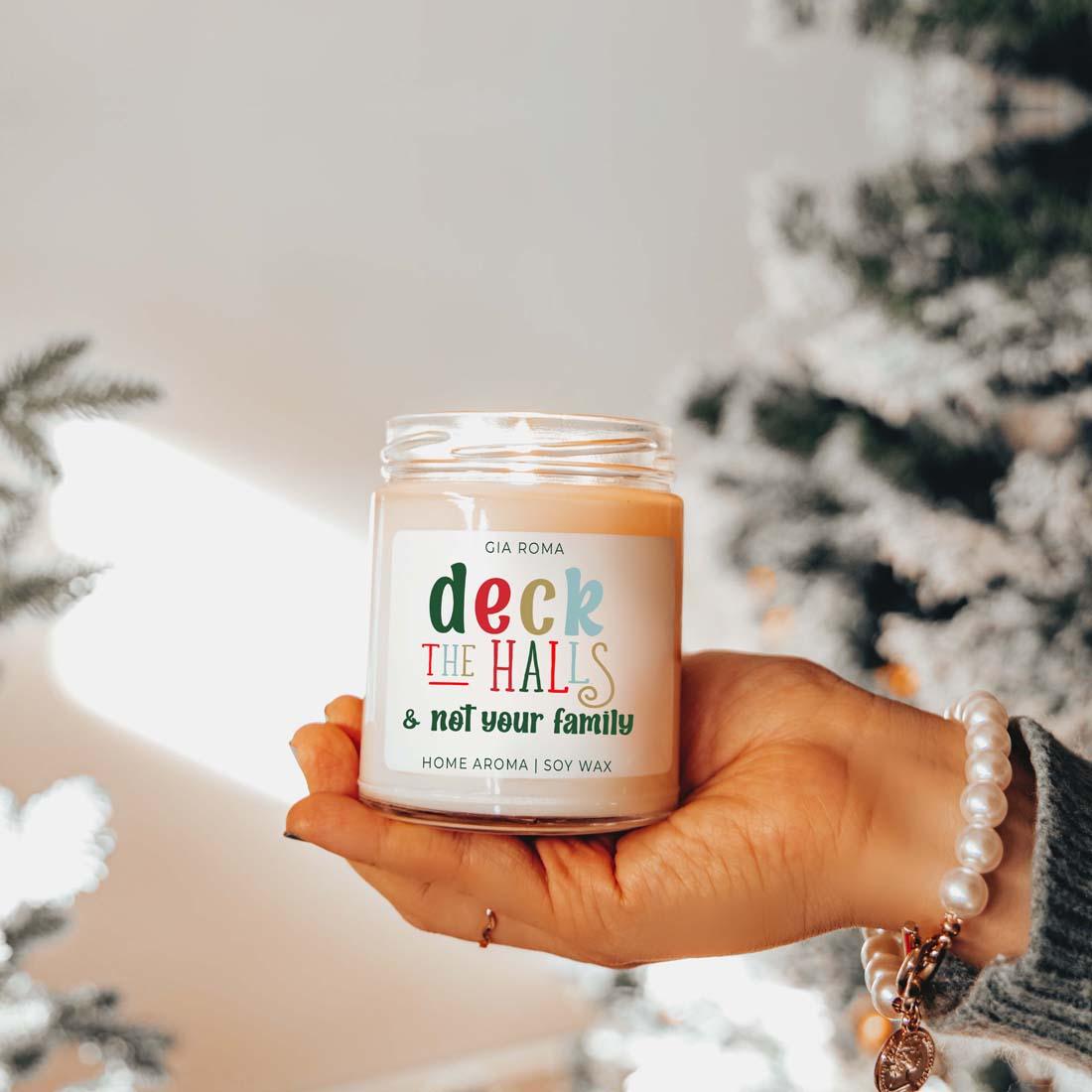 Deck The Halls Candle by Gia Roma in a glass jar with a colorful label, soy wax on Tampa Home & Garden Store