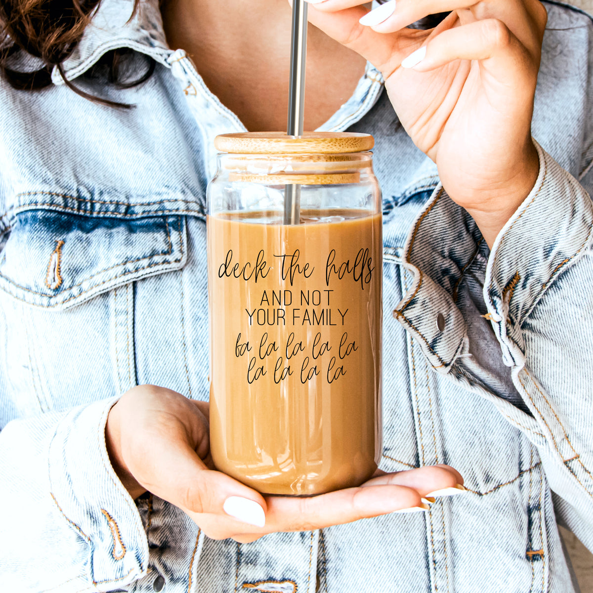 Deck the Halls 17oz glass tumbler by Gia Roma with wooden lid and metal straw, iced coffee inside on Tampa Home & Garden Store