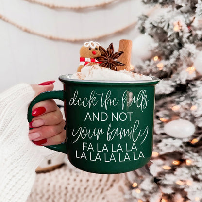 Gia Roma Deck The Halls green mug with white script, whipped cream, cinnamon stick on Tampa Home & Garden Store