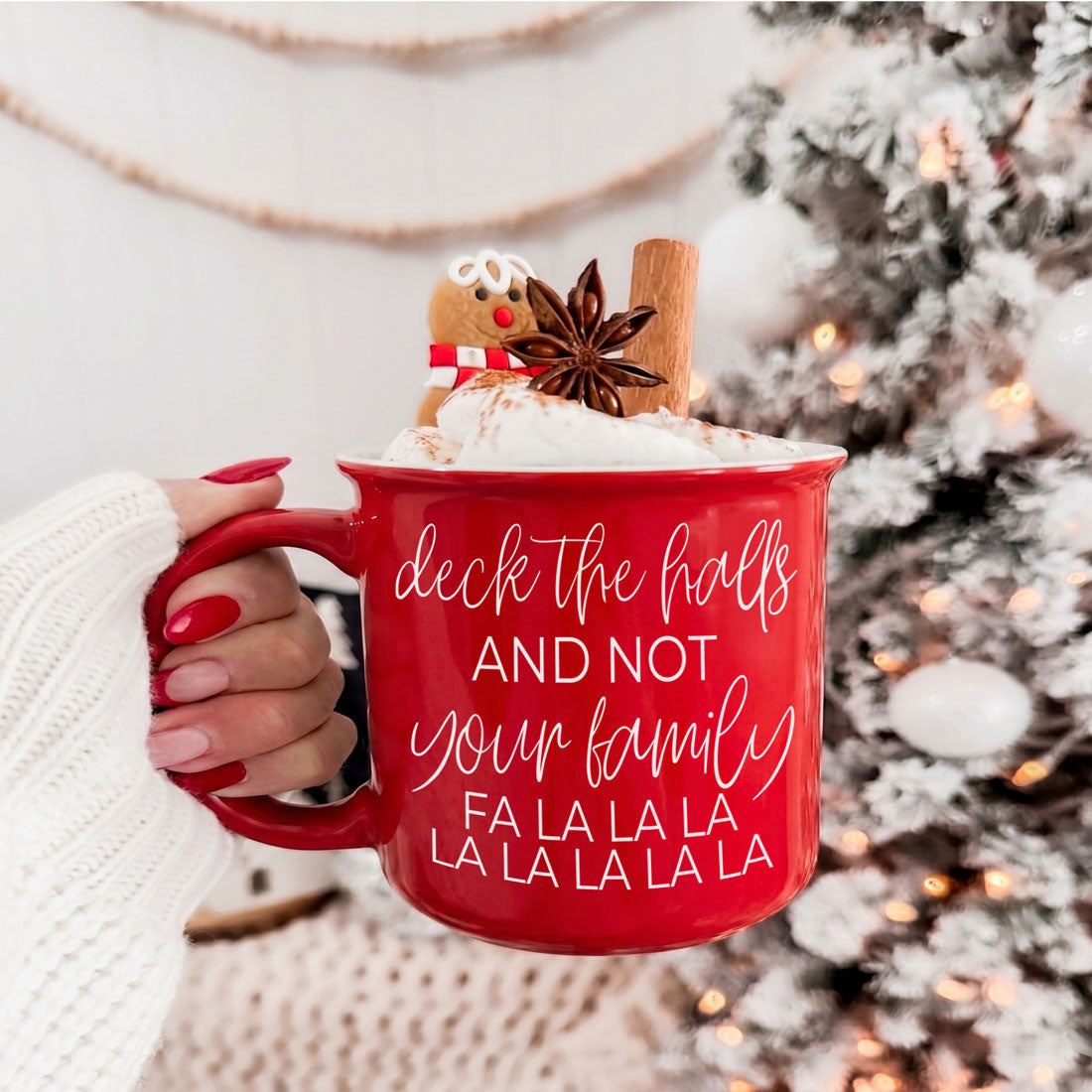 Deck The Halls Gia Roma coffee mug red with white script, topped with whipped cream and spices on Tampa Home & Garden Store