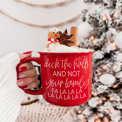 Deck The Halls Gia Roma coffee mug red with white script, topped with whipped cream and spices on Tampa Home & Garden Store