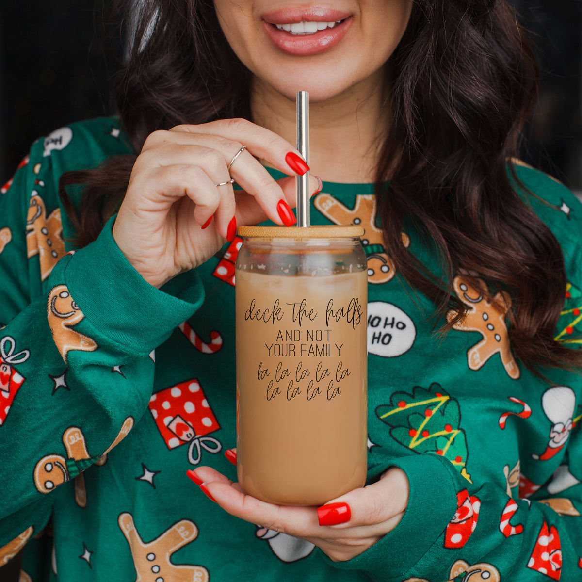 Deck the Halls 17oz glass cup by Gia Roma with metal straw and bamboo lid iced coffee inside on Tampa Home & Garden Store