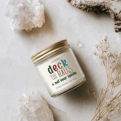 Deck The Halls candle by Gia Roma, glass jar soy wax with gold lid and colorful label on Tampa Home & Garden Store