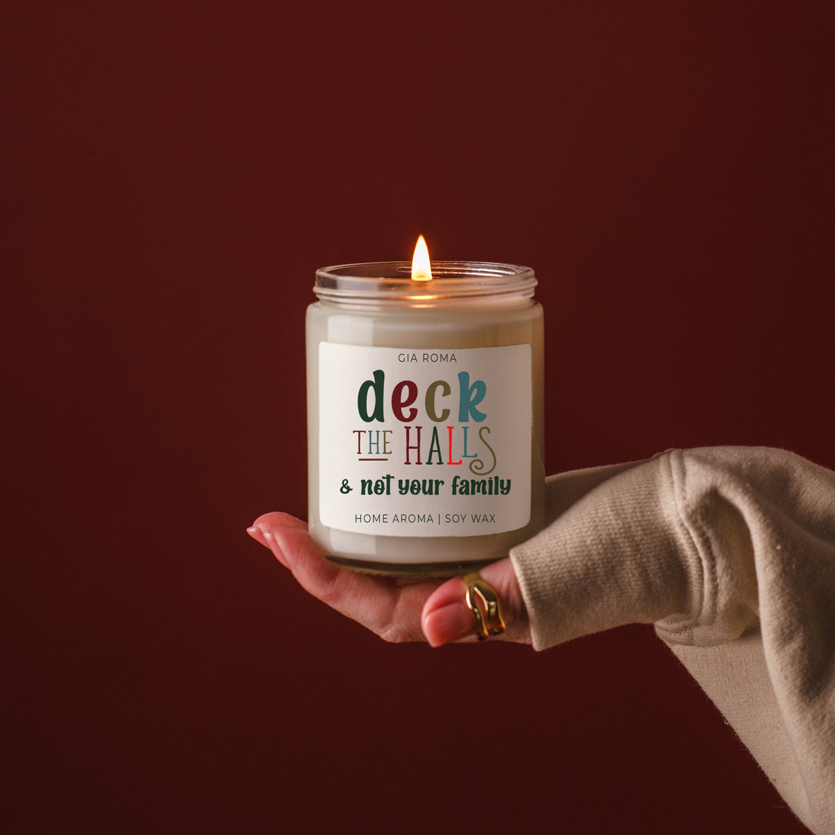 Deck The Halls candle by Gia Roma in a glass jar, white soy wax, hand-held on Tampa Home & Garden Store