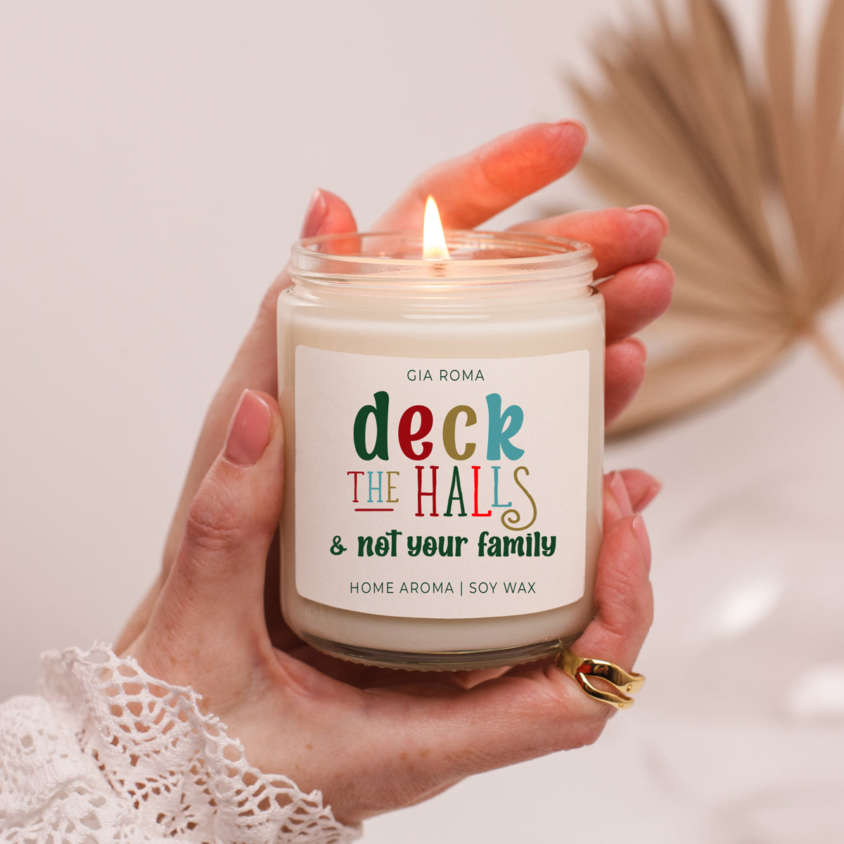 Deck The Halls Candle by Gia Roma in a glass jar with a colorful label, soy wax on Tampa Home & Garden Store