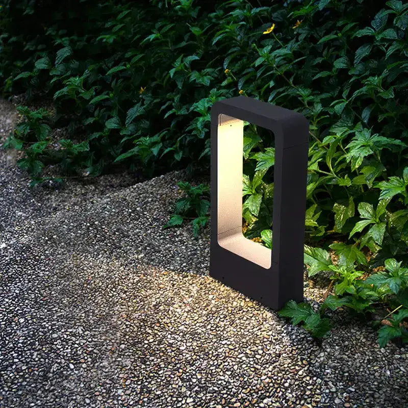 Modern black LED aluminum garden bollard light by Decorbites for pathways, open-frame design on Tampa Home & Garden Store