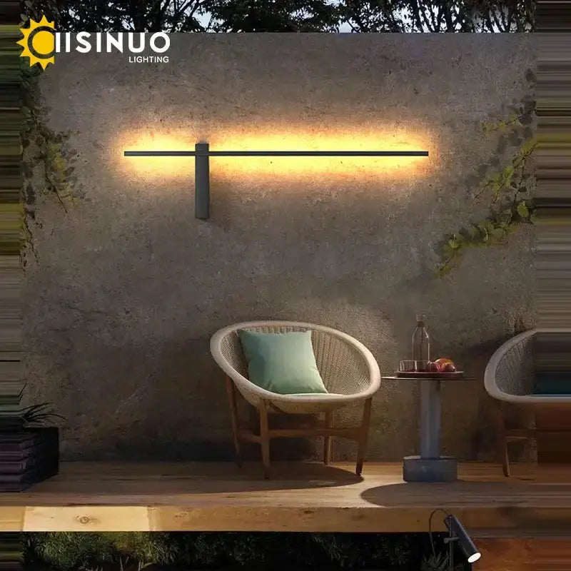 Modern minimalist black aluminum outdoor wall sconce by Decorbites with warm porch glow on Tampa Home & Garden Store