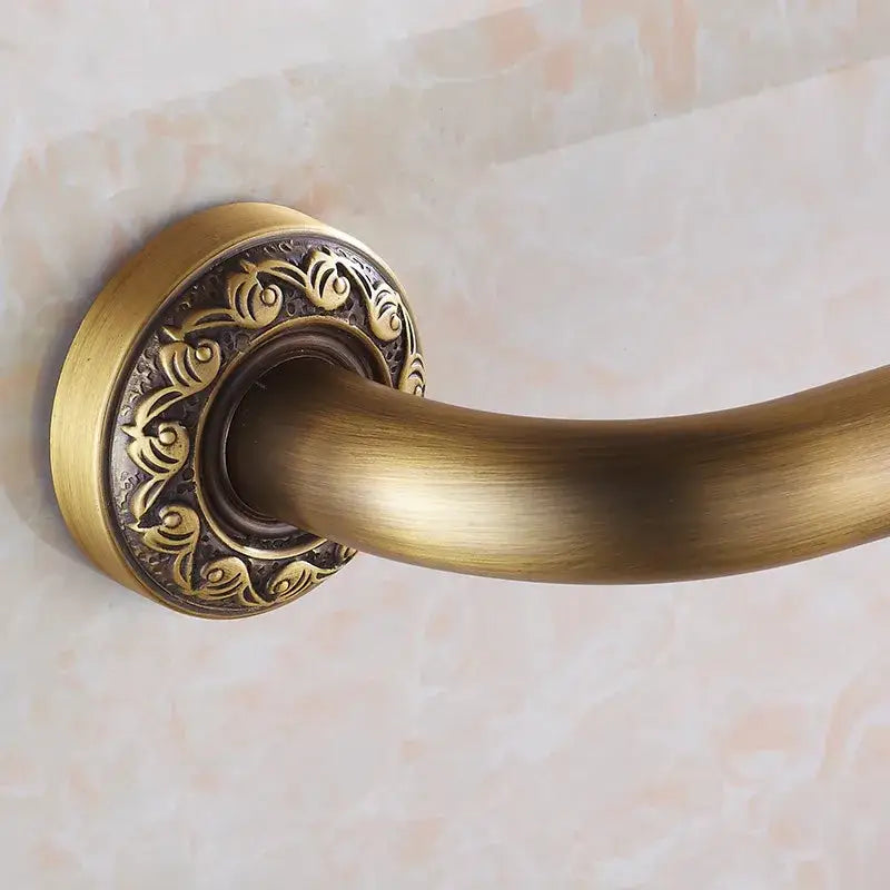 Brass safety bathroom handle Decorbites with ornate rosette plate antique finish on Tampa Home & Garden Store