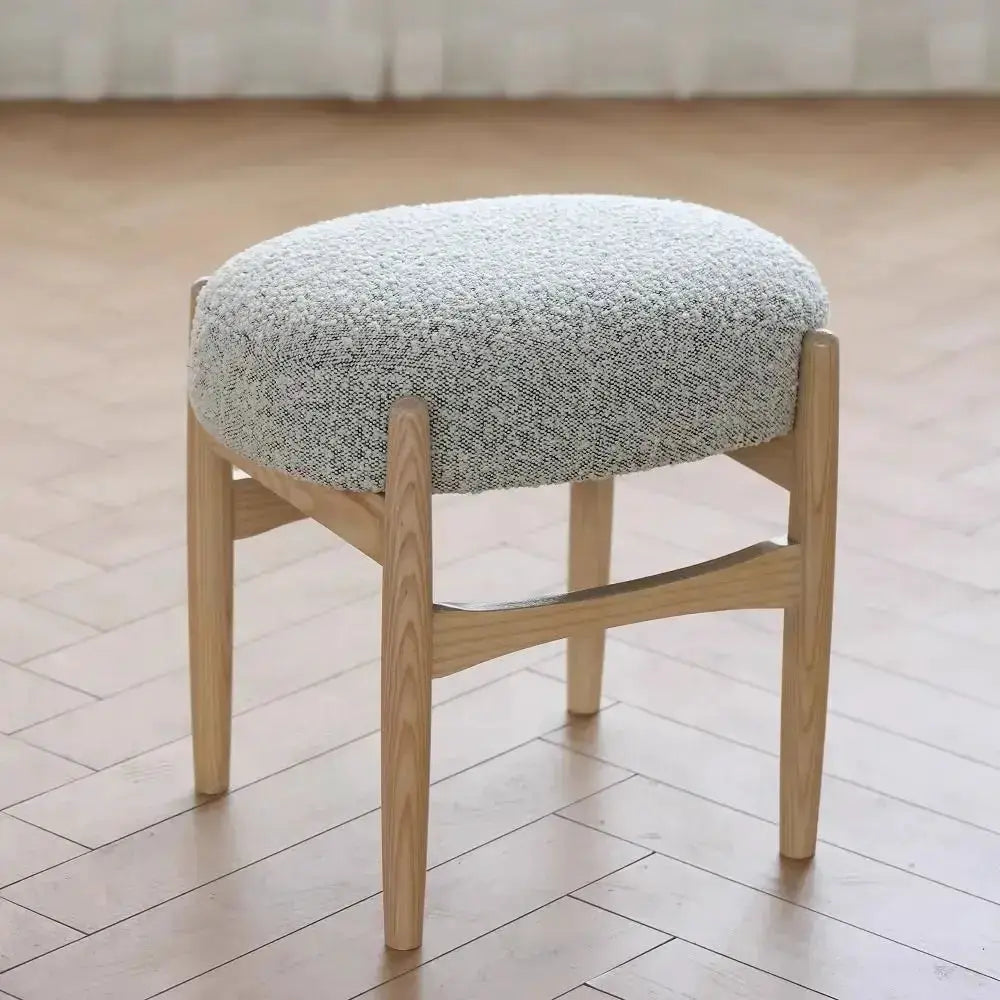 Mid-century gray ash wood makeup bench with round upholstered seat and tapered legs on Tampa Home & Garden Store
