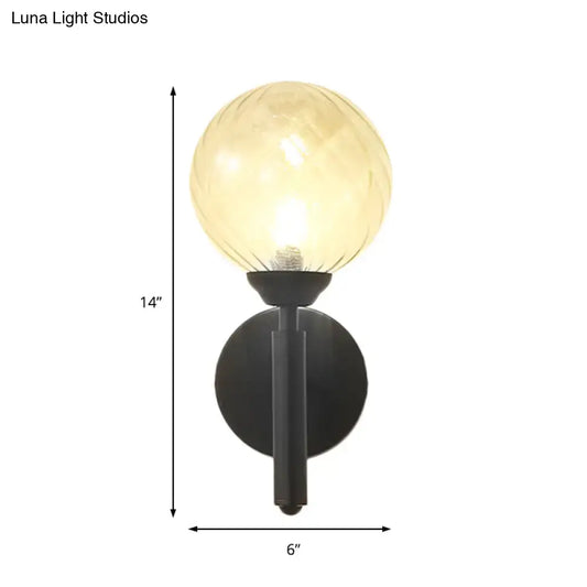 Decorbites Black Textured Glass Sconce with round globe on black metal wall mount, 14in tall on Tampa Home & Garden Store