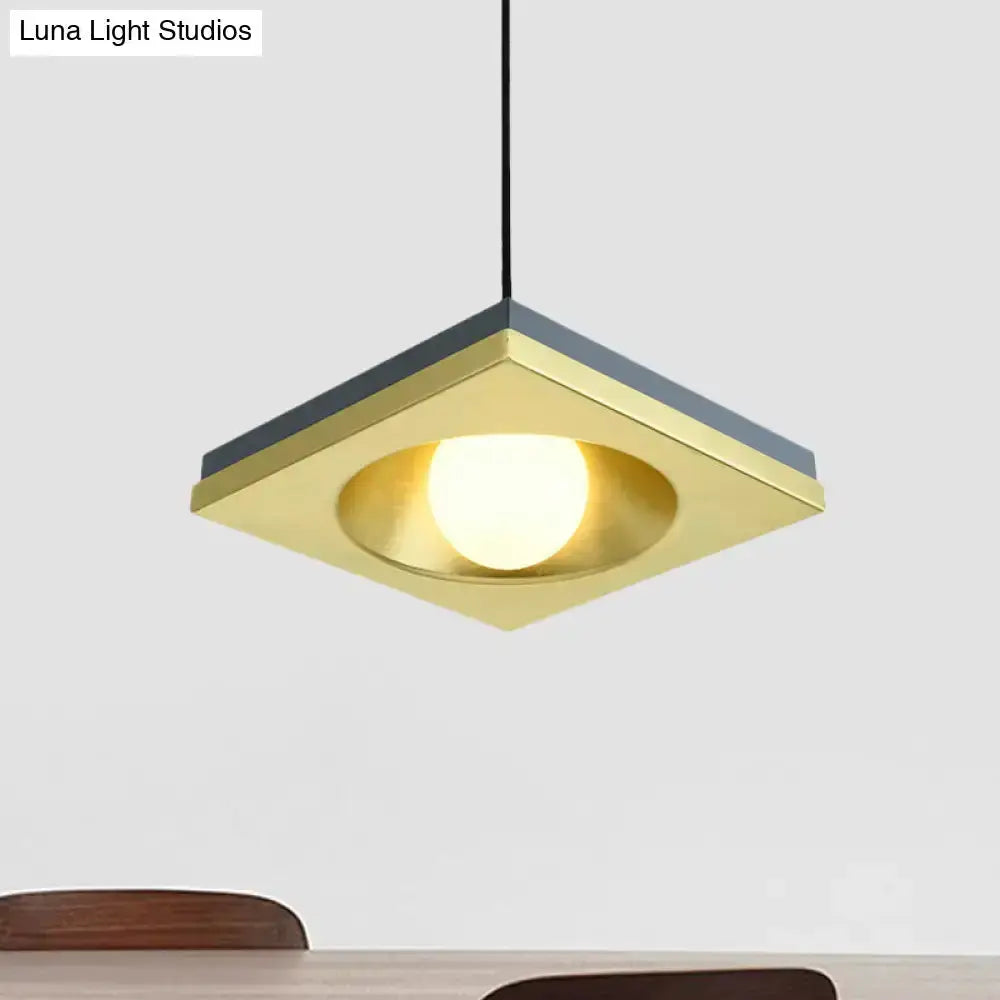 Modernist black & gold metal frame pendant light, square fixture with warm gold interior on Tampa Home & Garden Store