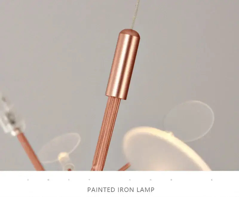 Rose gold painted iron branch chandelier with slender pendant rod and cylindrical cap on Tampa Home & Garden Store