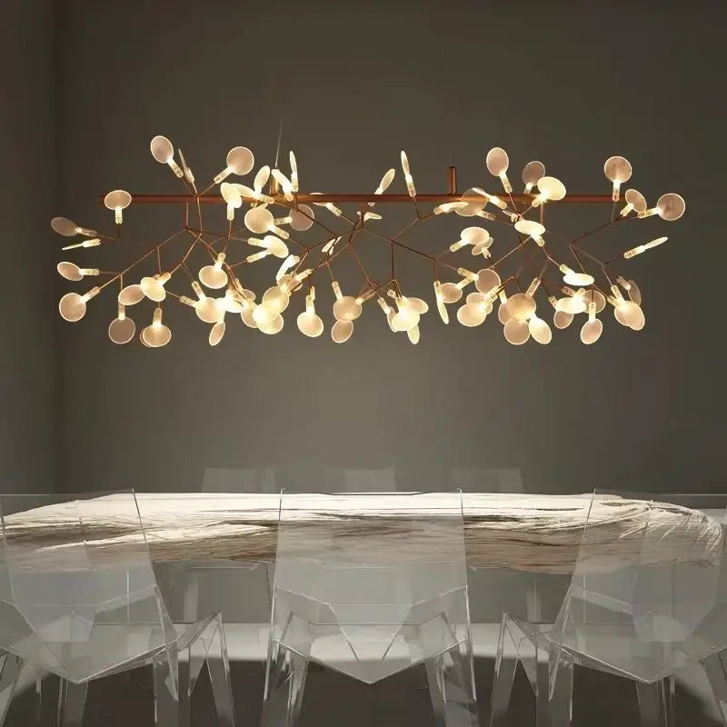 Rose Gold Branch Chandelier by Decorbites with glass disk bulbs over a wooden dining table on Tampa Home & Garden Store