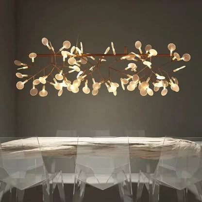 Rose Gold Branch Chandelier by Decorbites with glass disk bulbs over a wooden dining table on Tampa Home & Garden Store
