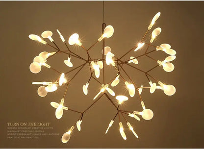 Rose Gold Branch Chandelier by Decorbites with a branching metal frame and warm LED bulbs on Tampa Home & Garden Store