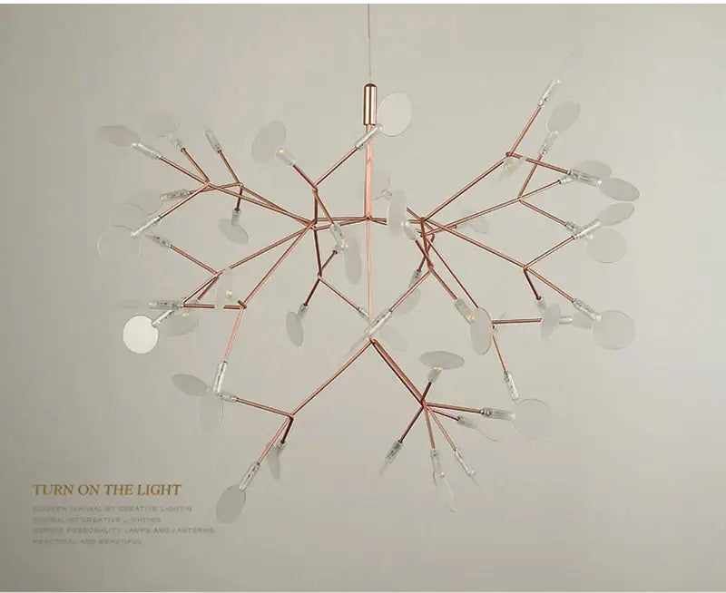 Rose Gold Branch Chandelier by Decorbites with copper-toned arms and clear disc accents on Tampa Home & Garden Store