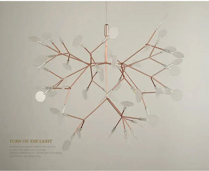Rose Gold Branch Chandelier by Decorbites with copper-toned arms and clear disc accents on Tampa Home & Garden Store