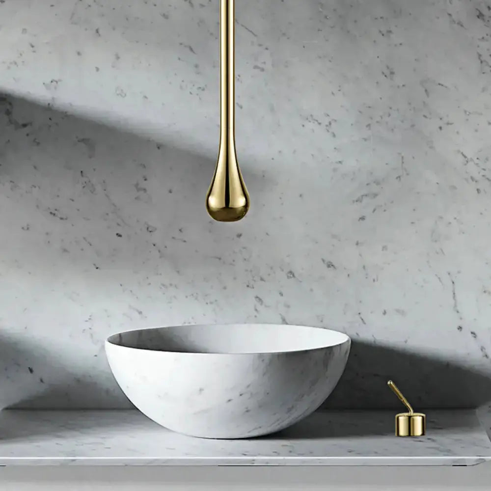 Decorbites brass single-handle bathroom faucet pendant light over marble sink on Tampa Home & Garden Store