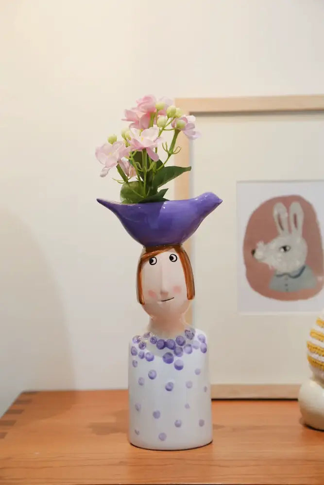 Blue Ceramic Vase Set; whimsical person-shaped vase with purple hat and pink blooms on Tampa Home & Garden Store
