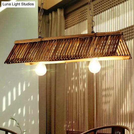 Bamboo Triangular Island Light pendant with a slatted bamboo frame and two bulbs by Decorbites on Tampa Home & Garden Store