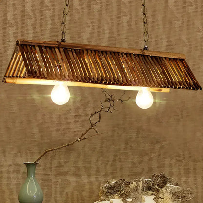Pendant light: Bamboo triangular island light with a slatted brown frame and two bulbs on Tampa Home & Garden Store