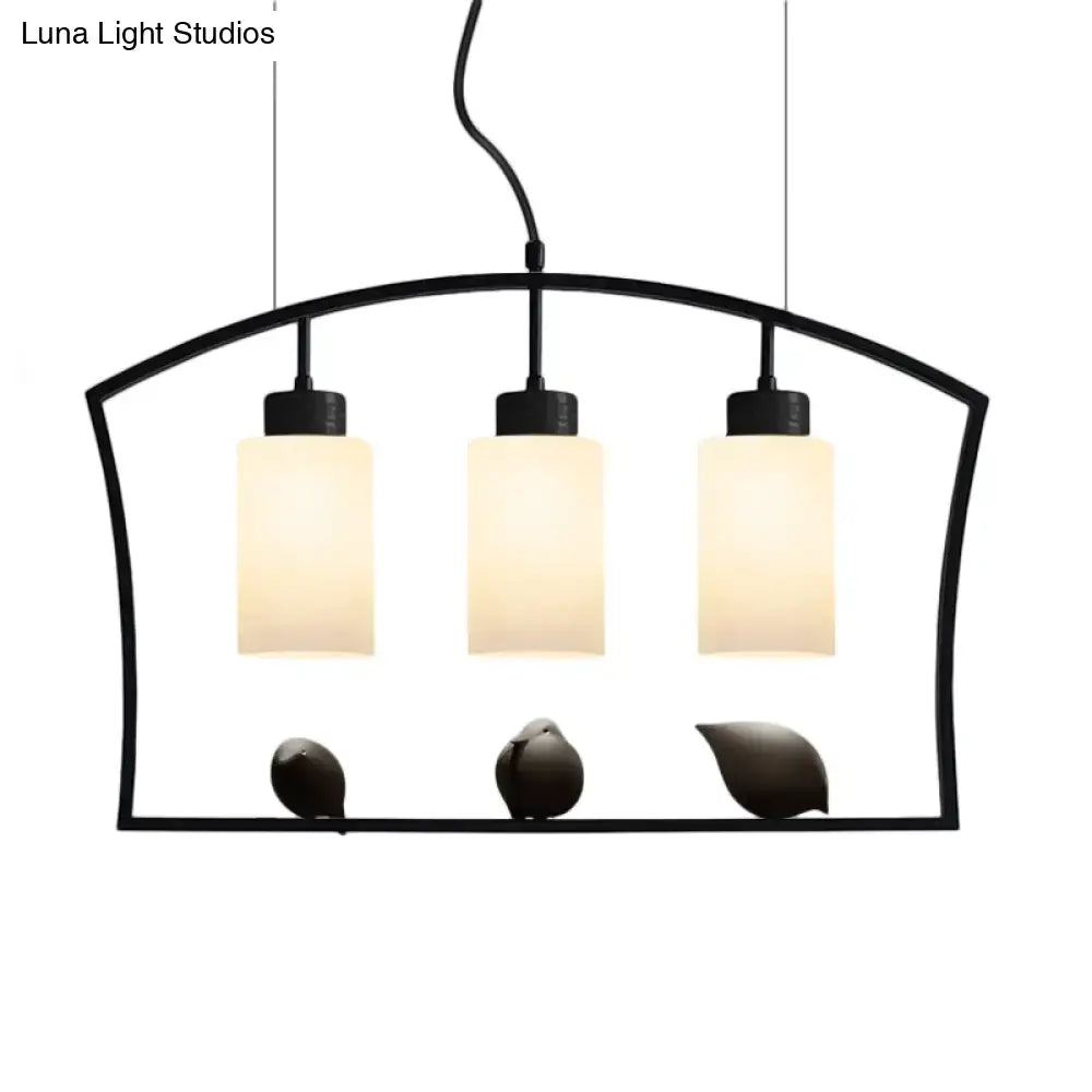 Black Cylinder Island Light pendant with three frosted glass shades on a black frame Decorbites on Tampa Home & Garden Store