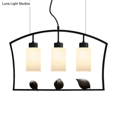 Black Cylinder Island Light pendant with three frosted glass shades on a black frame Decorbites on Tampa Home & Garden Store