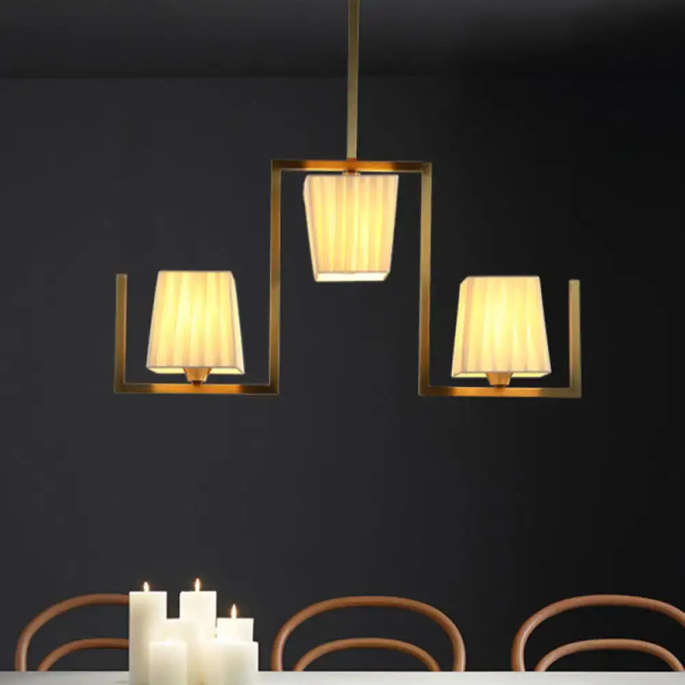 Decorbites brass modern flush mount ceiling light fixture with three beige pleated shades on Tampa Home & Garden Store
