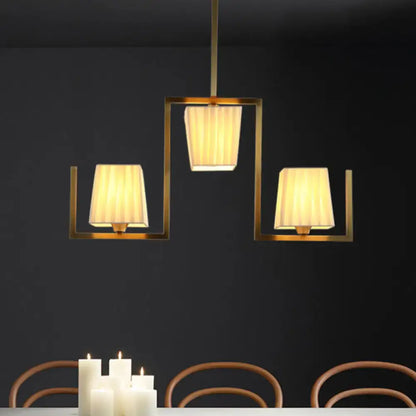 Decorbites brass modern flush mount ceiling light fixture with three beige pleated shades on Tampa Home & Garden Store