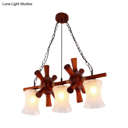 Nautical wood rudder pendant light, brown finish with 3 frosted glass shades for dining on Tampa Home & Garden Store