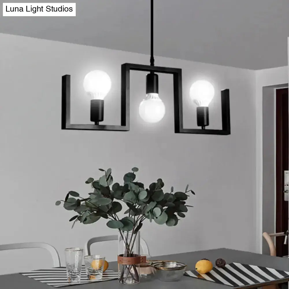 Industrial black metal island pendant fixture with three exposed bulbs for kitchen island on Tampa Home & Garden Store