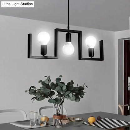 Industrial black metal island pendant fixture with three exposed bulbs for kitchen island on Tampa Home & Garden Store