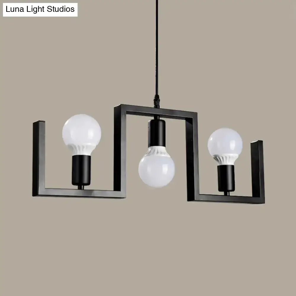 Industrial black metal island light pendant fixture by Decorbites with three bulbs on Tampa Home & Garden Store
