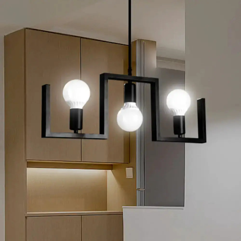 Industrial black metal island light fixture with 3 bulbs and square-frame pendants on Tampa Home & Garden Store