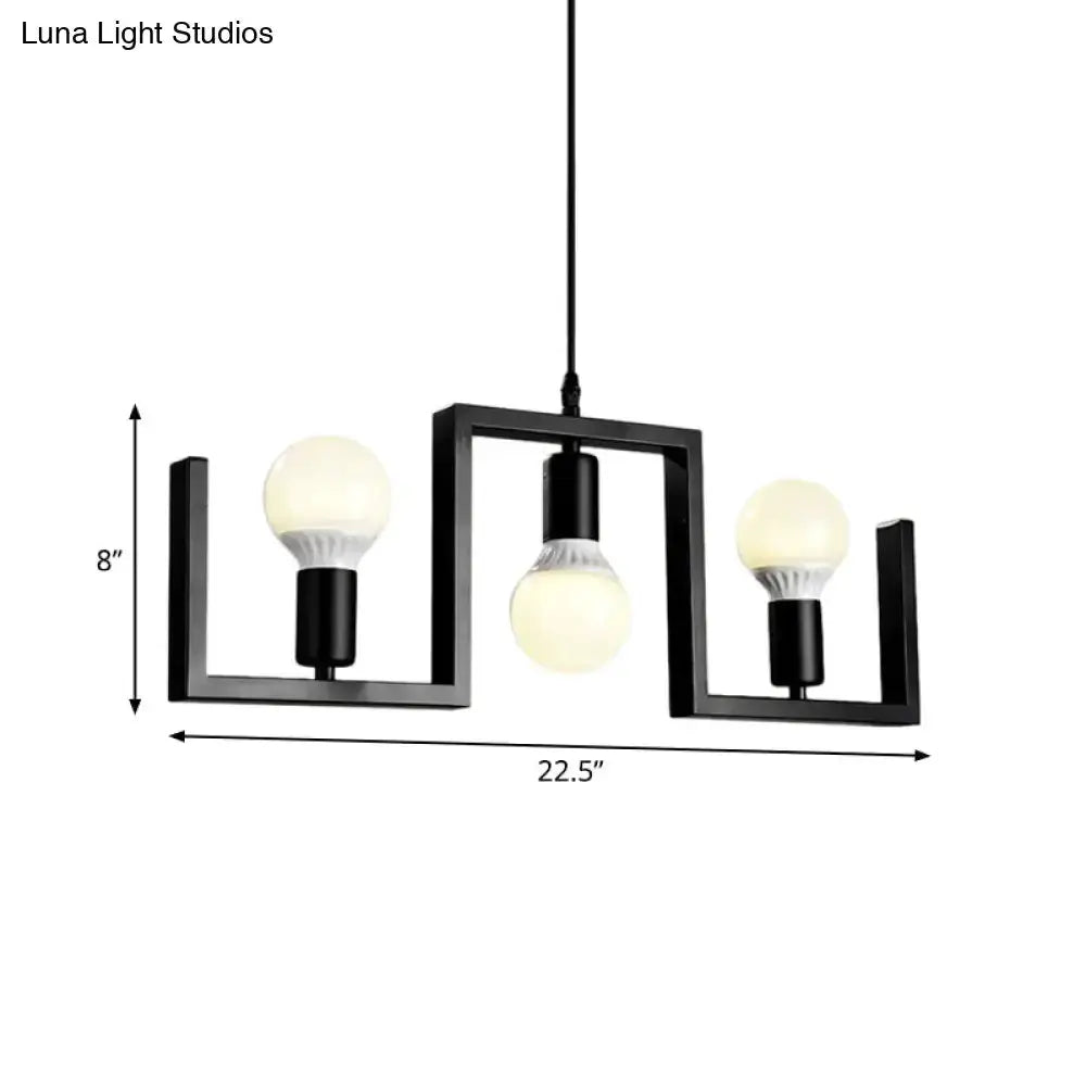 Industrial black metal island pendant fixture by Decorbites with three frosted globe bulbs on Tampa Home & Garden Store