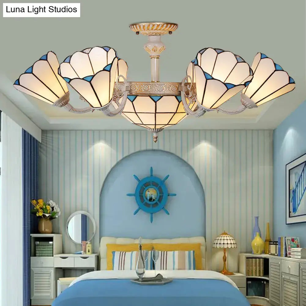 Cream blue glass chandelier with Tiffany-style petal shades, brass accents by Decorbites on Tampa Home & Garden Store