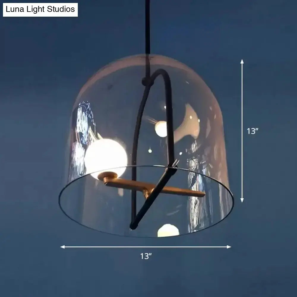 Modern clear glass cylinder pendant light with black frame by Decorbites on Tampa Home & Garden Store