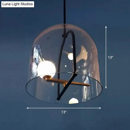 Modern clear glass cylinder pendant light with black frame by Decorbites on Tampa Home & Garden Store