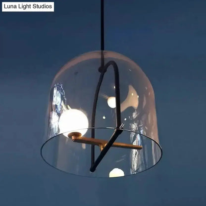 Modern clear glass cylinder pendant light with black frame by Decorbites on Tampa Home & Garden Store
