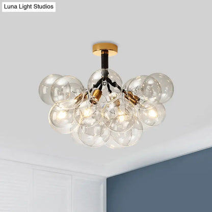 Decorbites Brass Black Bubble Light chandelier with clear glass bubbles on Tampa Home & Garden Store