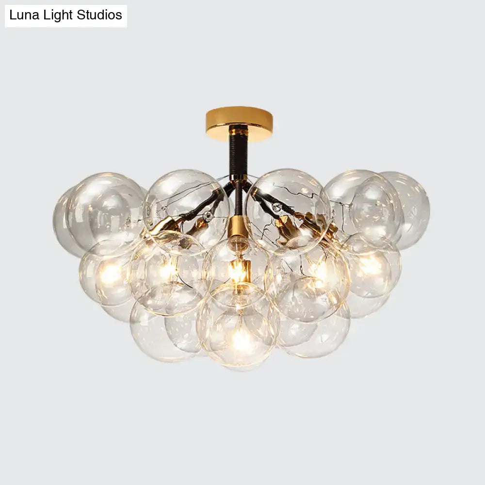 Brass Black Bubble Light chandelier with clear glass globes by Decorbites on Tampa Home & Garden Store
