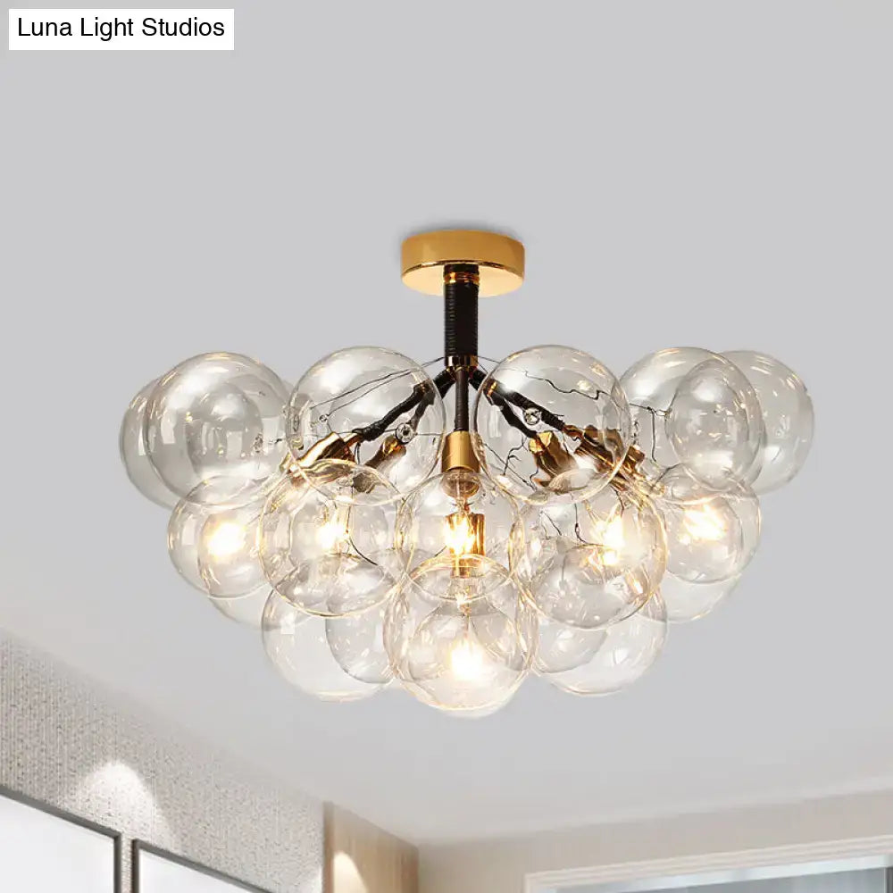 Brass Black Bubble Light Decorbites ceiling fixture with a cluster of clear glass globes on Tampa Home & Garden Store