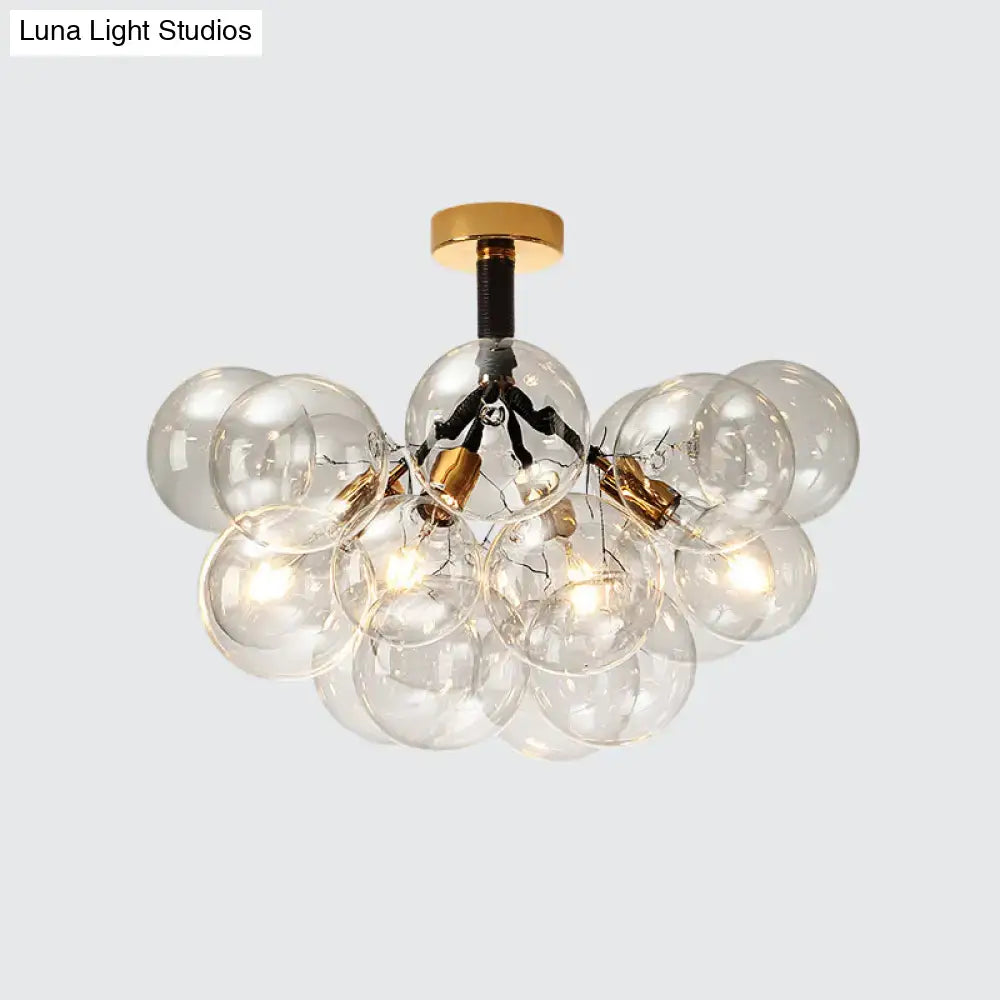 Brass Black Bubble Light chandelier by Decorbites with clear glass globes on Tampa Home & Garden Store